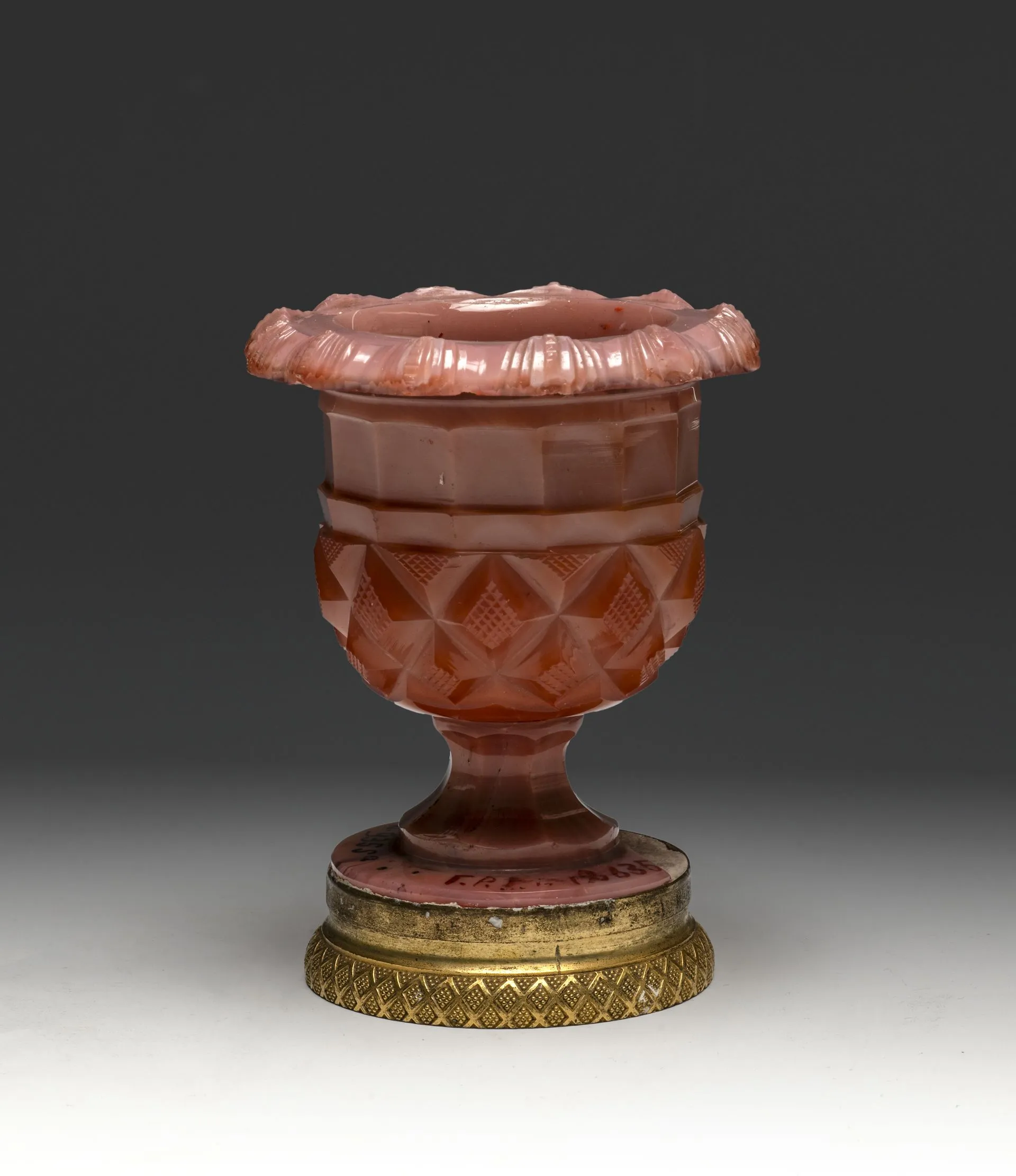 Vase on a stand. Mid-19th century. Opaque opalescent-pink coloured glass, blowing, diamond cutting; bronze, chasing, gilding