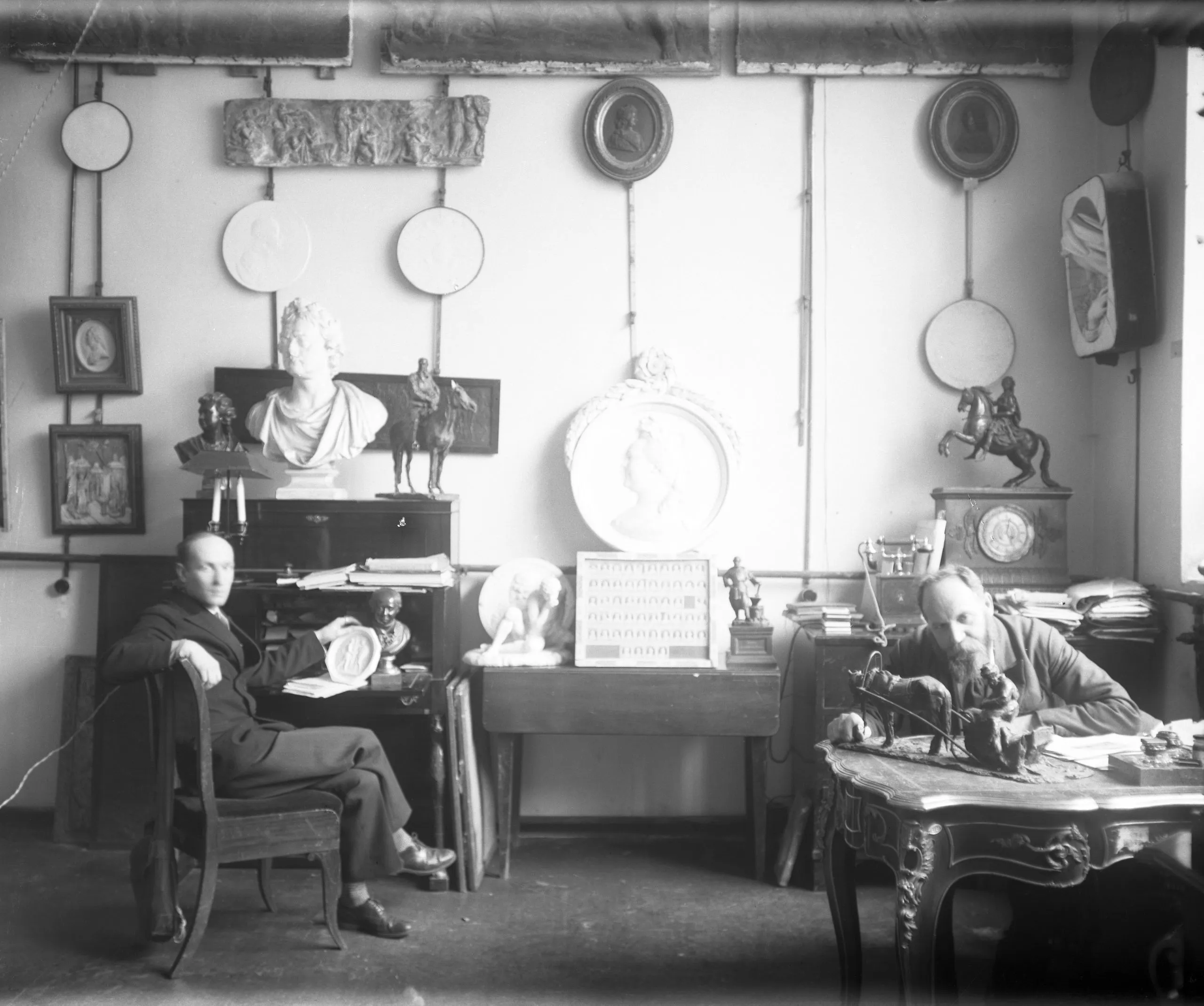 Vsevolod Petrov and Grigory Presnov in the collection store of the Department of Russian Sculpture. 1940–1941