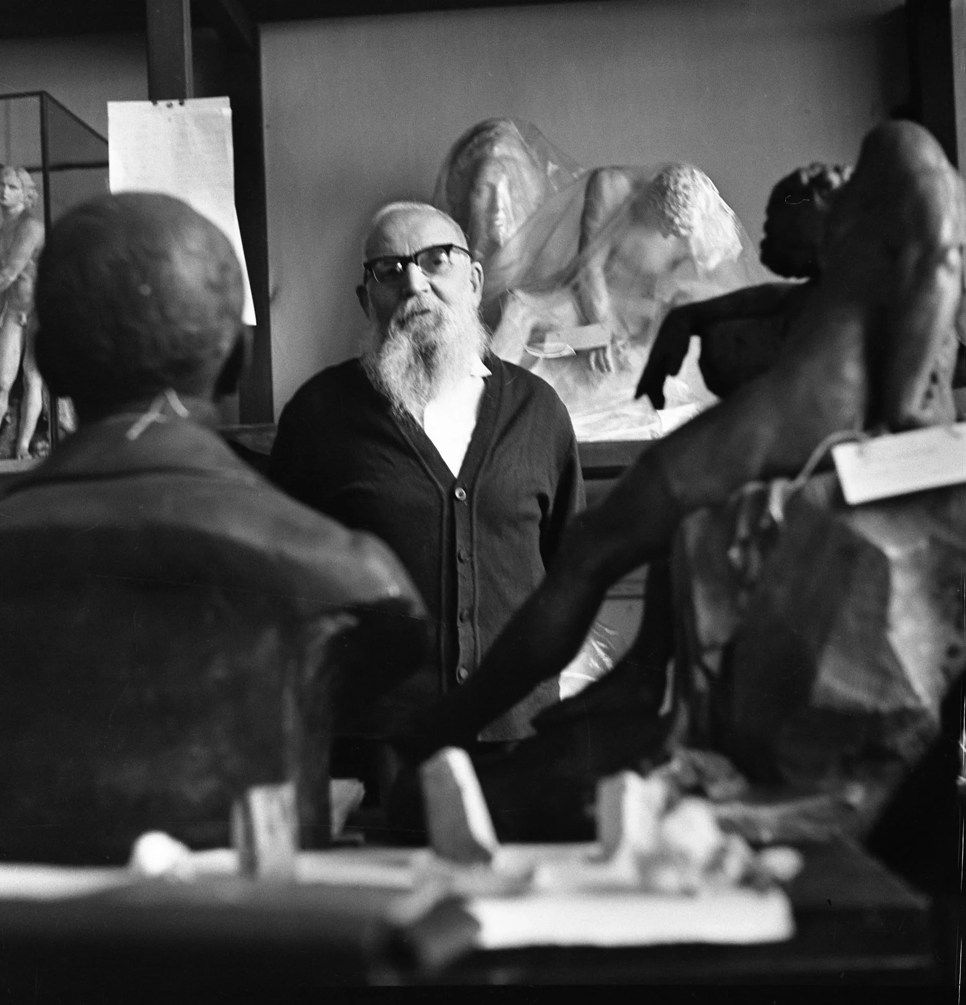 Grigory Presnov in the sculpture store during a voluntary work day at the Russian Museum. 15 April 1972